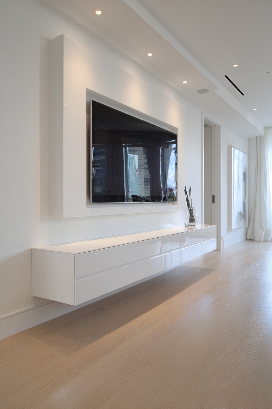 White floating console with hidden supports