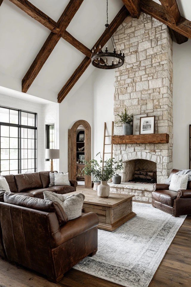 Dark walnut beams in vaulted white living room