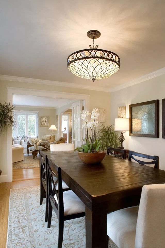 Ceiling-hugging fixture with decorative glass or metal