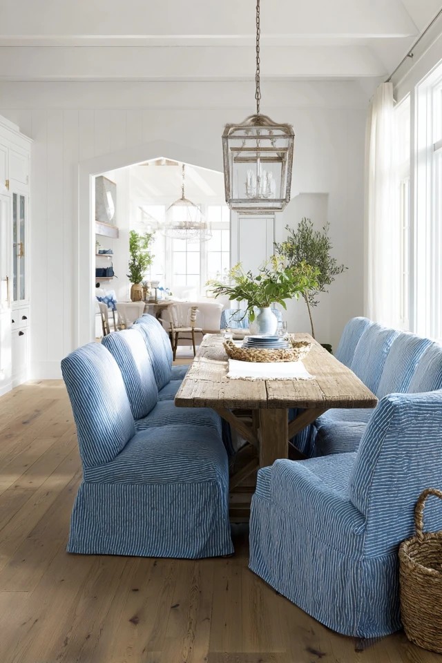 Dining chairs with washable blue slipcovers