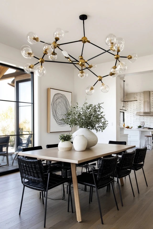 Chandelier combining distressed wood with black metal