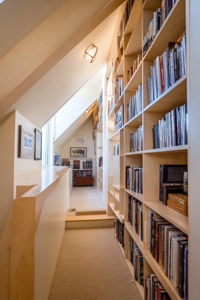Compact bistro table and chairs near the kitchen creating a functional dining zone in an attic apartment